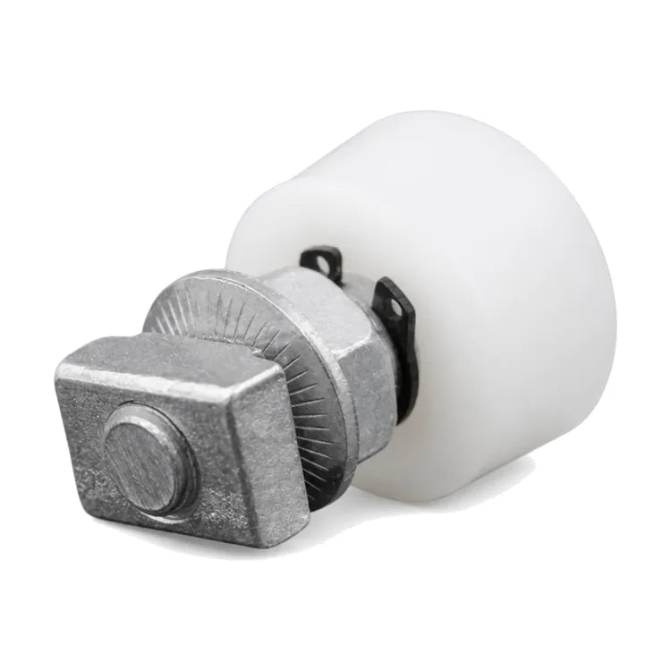 Schindler-compatible 547572 guide roller for 3300, V30 and QKS9 systems, 31 × 15 mm with M10 hardware, shown from the hardware side in a front three-quarter studio view.