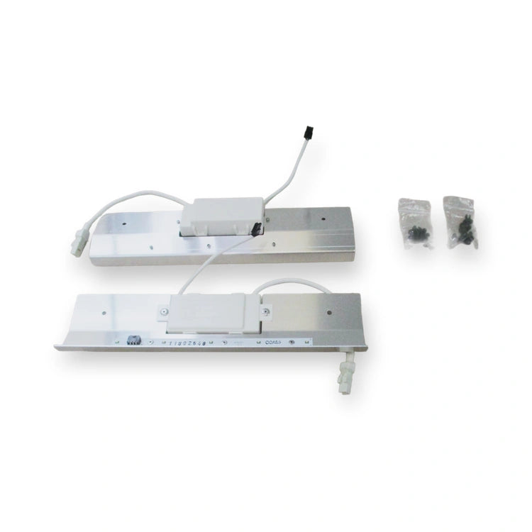 Schindler 59370851 LED car light kit for 3300/5300/6300: two aluminium LED profiles with transformers, cables and two bags of fixings, top view on white background.