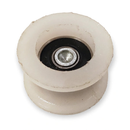Schindler Varidor 30 upthrust counter roller 34 mm, bearing side on white background.