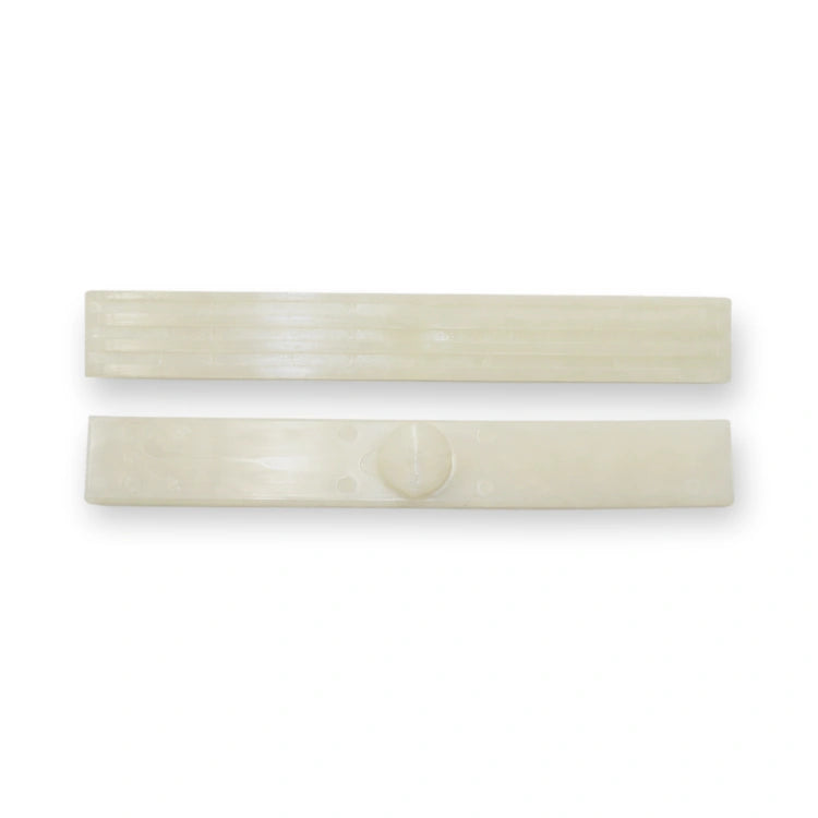 OTIS Compatible Guide Shoe Insert 150x20x5.8 mm for 16mm guide (FAA380G1), two cream plastic strips, one with a central circular button, on white background.