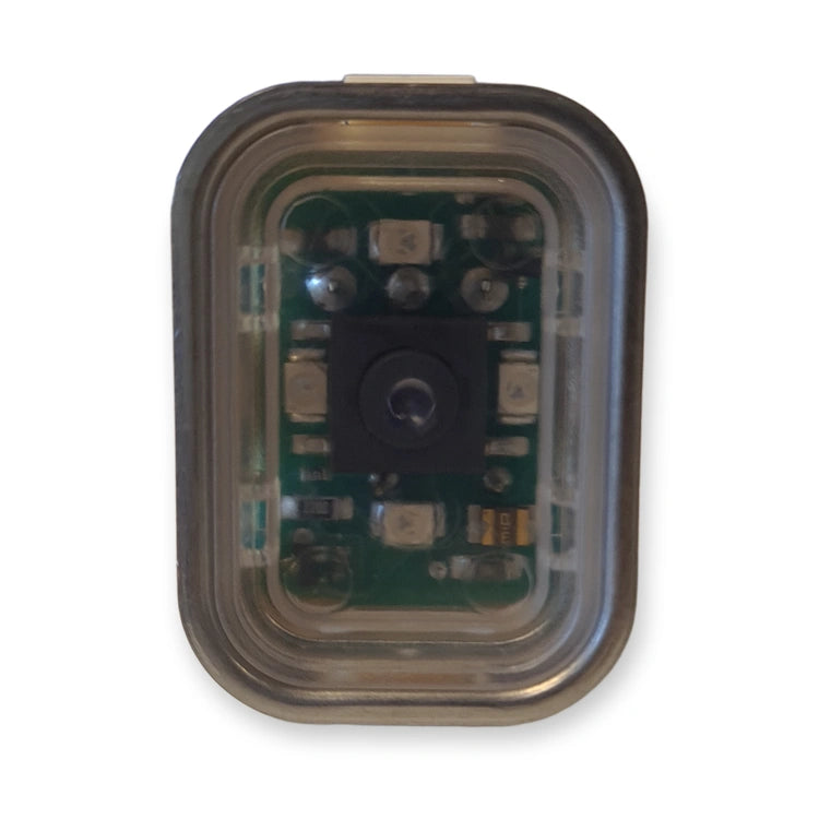 LiftLogic KK35 buzzer unit seen from above through the clear lens, showing the LED circuit board, on white background.