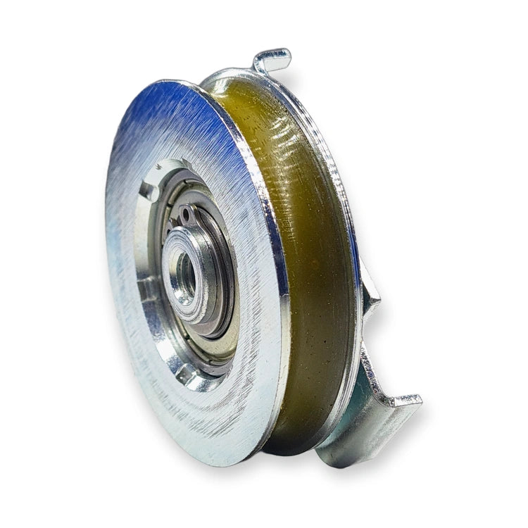 KONE ADX1/2 door hanger roller KM61501G13, 59.6 mm roller with bearing and zinc-plated bracket, front three-quarter view on white background.