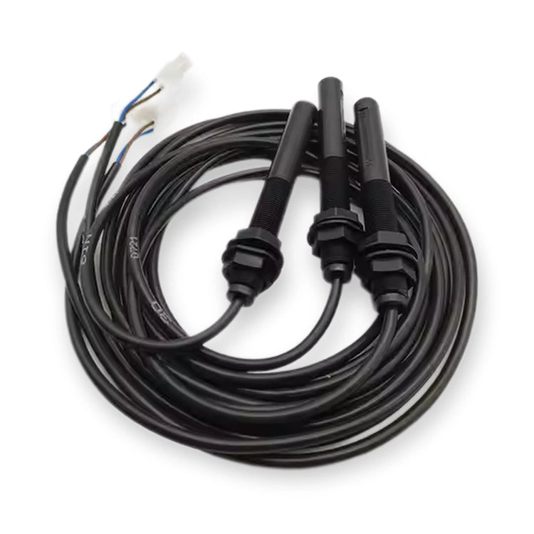 Kone Monospace Magnetic switch set 61U/61N/30 OEM (KM713226G01), top-down view of coiled black cables with cylindrical sensors and connectors, on white background.