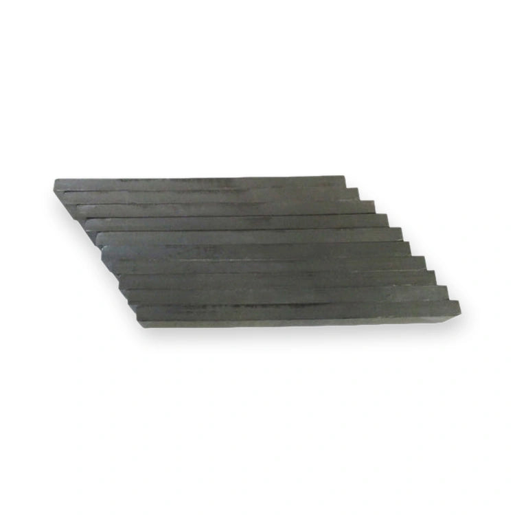 Kone Magnet Strip 120x15x6 mm LCE KM713228H01, stacked flat metal plates viewed from an angled side perspective, on white background.