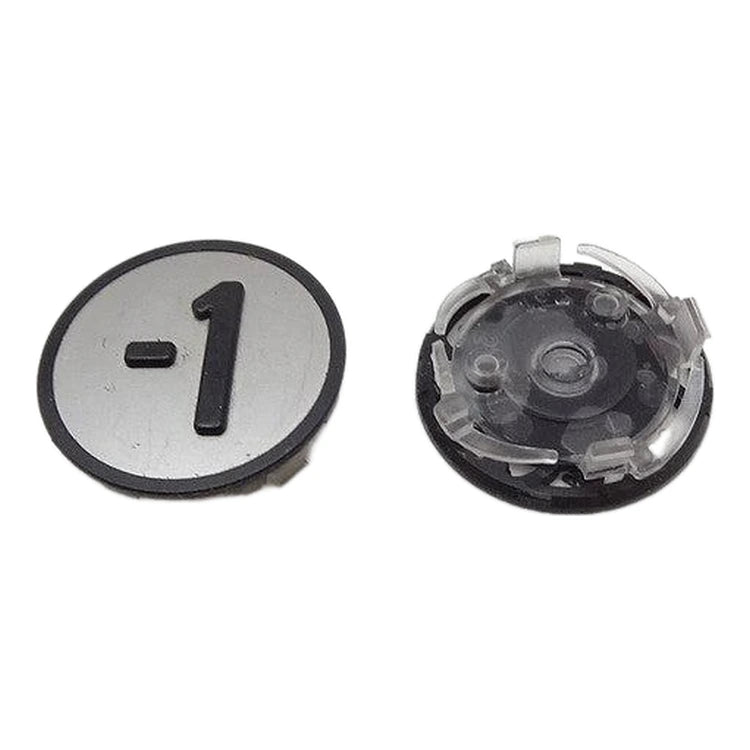 KONE KSS push button symbol -1 KM801054G071, grey with raised black tactile mark, front and back view on white background.