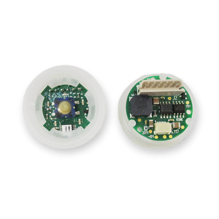 KONE FC PRIMARY BUTTON BASE KM804342G03 OEM, top-down view of two circular boards with central sensor and connector pins, on white background.