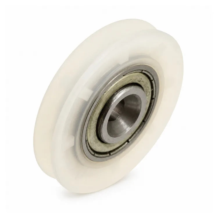 Fermator-compatible KM933390 synchronization rope roller, 47 × 9 mm, with a translucent white grooved wheel and recessed 6 mm bearing bore, SKU PFR.0800.00000, shown in a front three-quarter studio view.