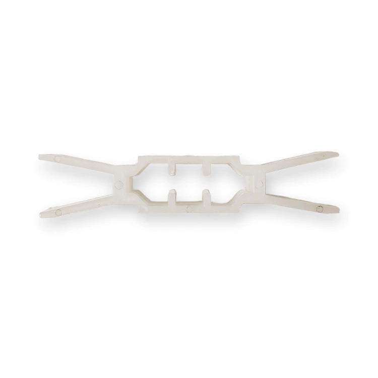 Schindler QKS6/8/9 compatible door guide shoe plastic insert, white, top view on white background.